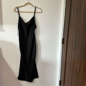 🌟3/$20🌟 Black midi slip dress. NWT. Size xs